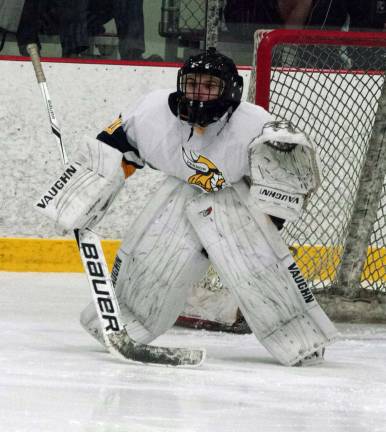 Vernon goalkeeper Ozzie Deluca stands guard in front of the goal post.