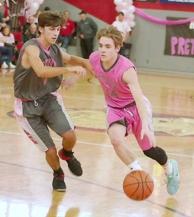 Vernon's D.J. Springstead dribbles the ball while covered by High Point's Donald Bassani in the second half of a game last season