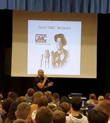 DMC speaks at Glen Meadow Middle School.