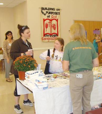 Visitors listen to healthy tips at the Sussex County School Nurses table