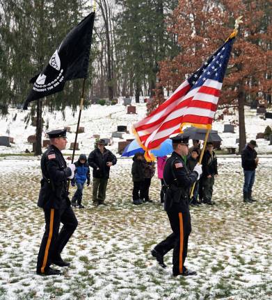 The Sussex County Sherriff's Department Honor Guard posts the Colors.