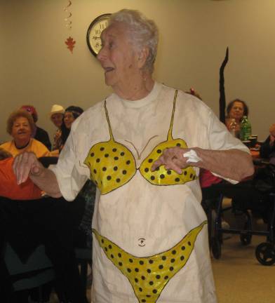 As the DJ played Itsy Bitsy Teeny Weeny Yellow Polka Dot Bikini, Pat Reilly laughingly responded to the song at the Vernon Senior Center Halloween party.