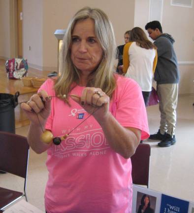 Church hosts community health fair Kelly Zukswert of Sparta Cancer Center discusses breast cancer awareness and self exams.
