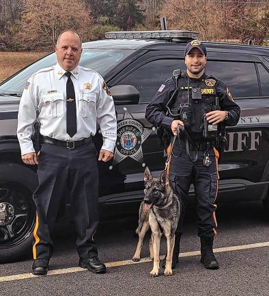Three join sheriff’s office Sheriff Michael Strada and Sheriff’s Detective Nicholas Galvao.
