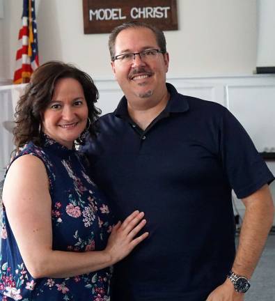 Crossroads Church Pastor Anthony Gambino, right, stands with his wife, Jennifer, in the church. Photo by Vera Olinski