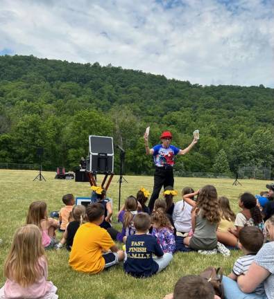 Mr. Magical does a magic show for children.