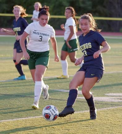 Vernon girls' soccer tops Sussex Tech Vernon's Martina Brich passes the ball with her foot in the first half. Brich scored 1 goal