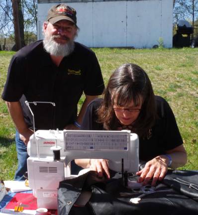 Vernon&#xfe;&#xc4;&#xf4;s Perfect Timing Sewing Machine Company was on hand to sew patches onto leather, through denim pockets and practically anything else. Manning the tent were Jon and Maureen Lasslett.