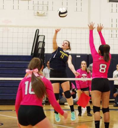 Jefferson wins Dig Pink volleyball match Vernon's Julia Dehnert (11) strikes the ball.