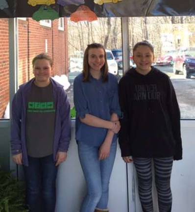Ogdensburg students complete 2,500 acts of kindess The three individual winners of the Great Kindness Challenge pose under the contest race track, used to track the studentsþÄô acts of kindness. From left, Gia Bonard, Jade Lally, and Hannah Panzarella.