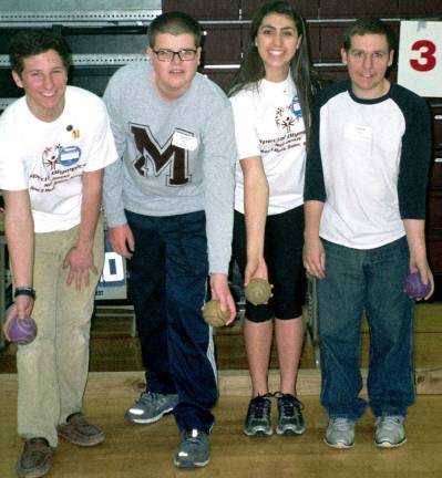 Showing their good form at the Area 3 Special Olympics Bocce Meet at Madison High School are, from left, Special Olympics volunteer Matt Driscoll, Special Olympics athlete Oliver Pierce, and Special Olympics volunteer Taylor Camp, all of Madison, and Special Olympics athlete Aaron Bono of Wantage.