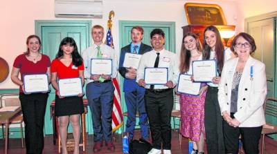 From left are Julia Seiminski, Amanda Lo, Parker Hein, Corey Vander Groef, Thomas Galvez, Makenzie Genung, Makenna Thomas and Sally Burns, chairwoman of the Good Citizens Awards for the Chinkchewunska Chapter of the National Daughters of the American Revolution. (Photo provided)