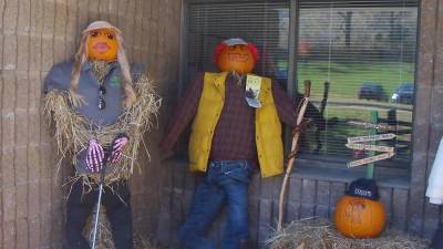The Municipal Building elaborated on Vernon's status as a four season recreational community with scarecrow golfer and scarecrow hiker.