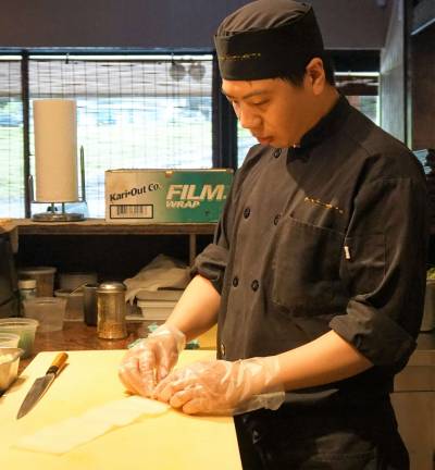 Sushi Chef Jian creates edible works of art at Wing's.