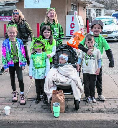 Children are dressed for the parade.