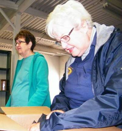 First Presbyterian Church of Sussex member Paula Houck, left, volunteering at the Skylands Outreach Depot on Sept. 27 with Wallkill Valley Rotary Club No. 5560 28-year member Mary Ann Seeko, right, who serves as the club&#x2019;s secretary.