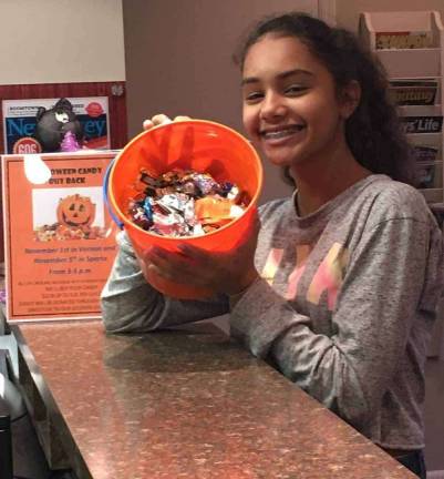 Children donate Halloween candy Children donate Halloween candy