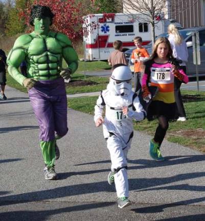The Incredible Hulk (Walnut Ridge physical education teacher Todd Piontkowski) chases an Imperial Stormtrooper.
