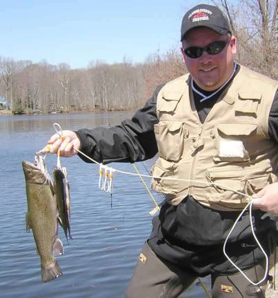 SOURCE: state.nj.us.com Catching trout at White's Pond in Newton.