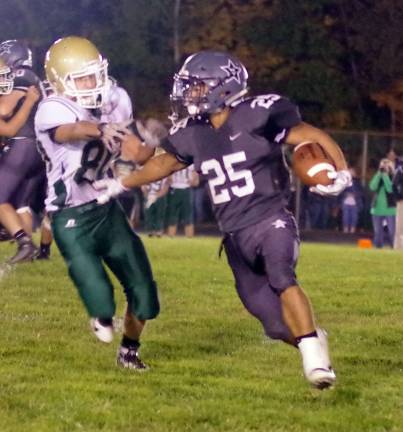 Wallkill Valley running back Michael Torres is pursued by a Sussex Tech defender.