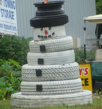 This out-of-season snowman was spotted outside an auto repair shop on Route 94. Have we had enough of the hot, humid weather recently?