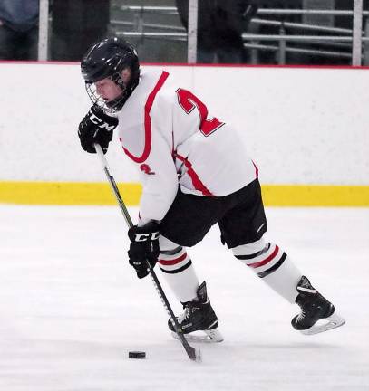 The puck is controlled by High Point-Wallkill Valley's Luca Carnemolla.