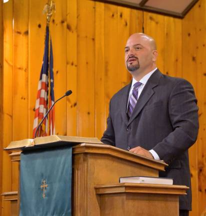 Local church to install new pastor Pastor Michael Rojas preaches in Christ Community Church.