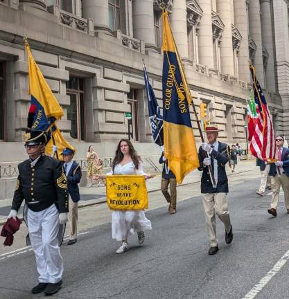 Happy Birthday America! Little Known but Lively 4th of July Parade Wows Lower Manhattan Sons of the Revolution Color Guard, including an Adidas sneaker-wearing “daughter” carrying the organization’s banner dated 1775-1783.