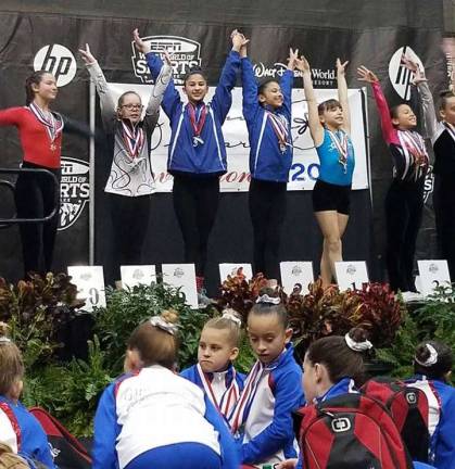 Xcel Bronze Gators Arianna Frank of Glenwood in 2nd place and Ariana Begraft of Hampton in 4th for Floor exercise.