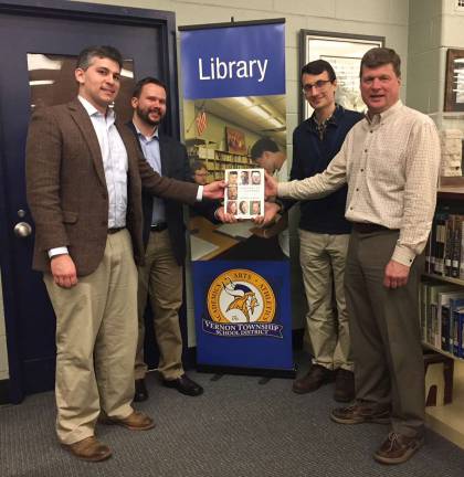 Shown, from left, are: AP History teachers Guy Della Torre, Matthew Trokan and Kelsey Falkowski and library specialist Stephen Denn.