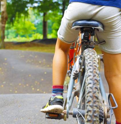 child on a bicycle- pump track outdoor