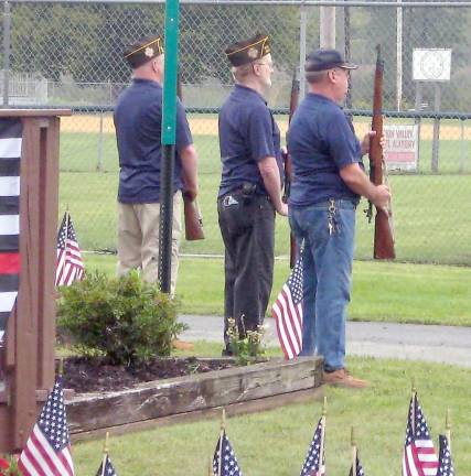 Members of the VFW prepare for a gun salute honoring the victims of September 11. (Photo by Janet Redyke)