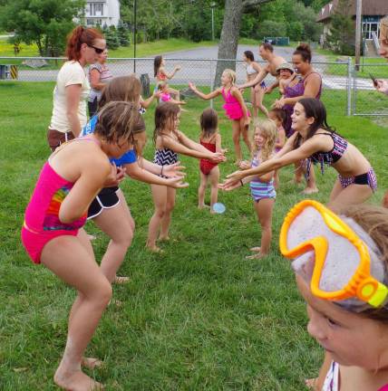 The water balloon toss ended in a free-for-all water balloon fight.