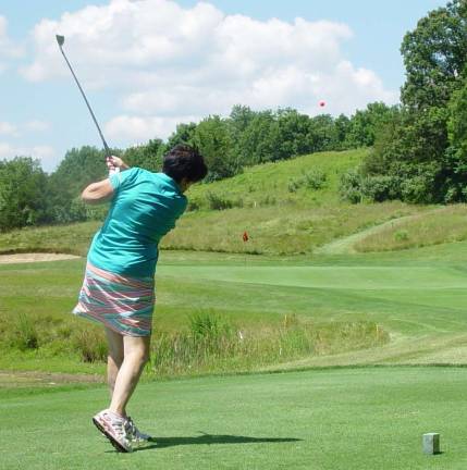 Ballyowen hosts Crystal Cup qualifier Buffy Whiting attempts to hit her tee shot close to the pin on hole #11.