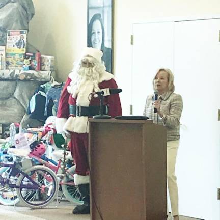 Chosen Freeholders Member George Graham (aka Santa) and Project Self-Sufficiency's Executive Director, Deborah Berry-Toon, at a Season of Hope Toy Drive kick off.