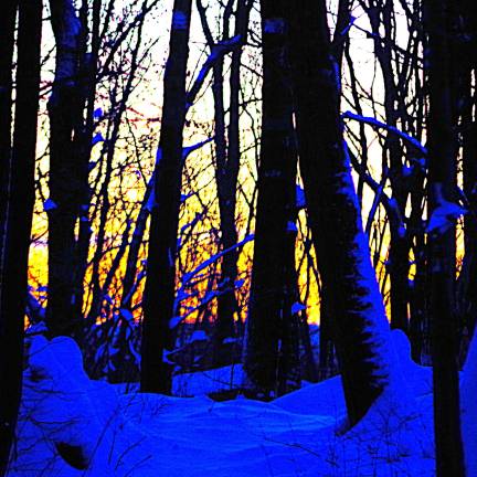 Photo by Chris Wyman On Sunday morning following the first major snowstorm of the season, the sun is shown rising with brilliant colors at Wawayanda State Park in Vernon.