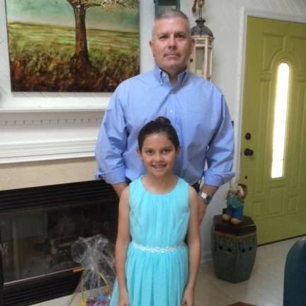 Sparta's Maloney has a heart changing Easter Photo provided Tim Maloney with his daughter Jenna. Maloney was saved with a heart transplant.