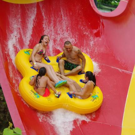 Action Park visitors are shown emerging from the initial freefall of High Anxiety; clearly the most colorful of the park&#xfe;&#xc4;&#xf4;s many rides and attractions.