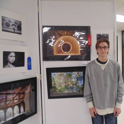 Alex Cohen, Sparta High School, stands by his photograph called Raining Fire.