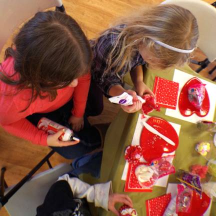Barry Lakes hosts decorating cake Isabella Ferreri, 10 and Katie Molini, 8 put the finishing touches on their cupcakes.