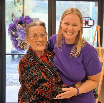 From left, Hardyston Mayor Leslie Hamilton congratulates Painted Grape Art Manager and Founder Beckie Sajban.