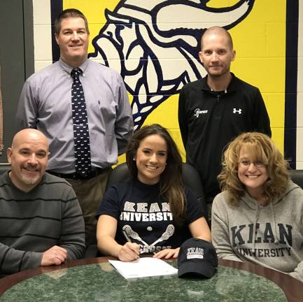 Alter signs with Kean for lacrosse Standing, from left, are: Athletic Director Bill Foley and girls lacrosse coach Steve Carlson. Seating from left, Dave Alter, McKenzie Alter and Jen Alter.