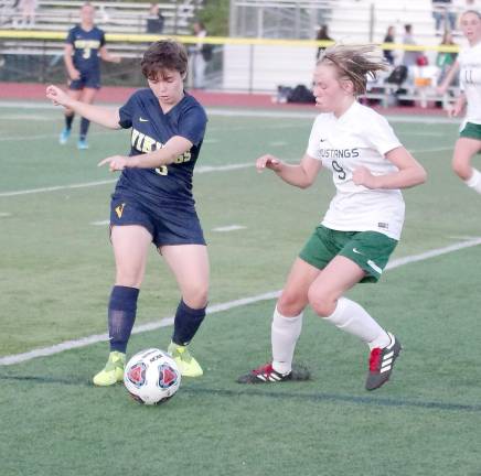 Vernon girls' soccer tops Sussex Tech Vernon's Lara O'Toole and Sussex Tech's Catrina Pascale battle for control of the ball