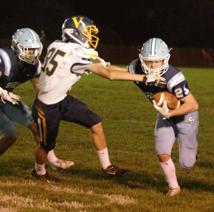Sparta Spartan Brendan Cina moves the ball through an opening in the Vernon Vikings defense in the first half. Cina caught a 27-yard touchdown pass. Sparta High School (Sparta Township, N.J.) defeated Vernon Township High School (Glenwood, N.J.) in football on Friday October 5, 2018. The final score was 55-7. The game took place at Sparta High School.
