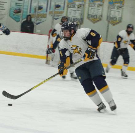 Vernon's Shane Brennan steers the puck. Brennan scored two goals.