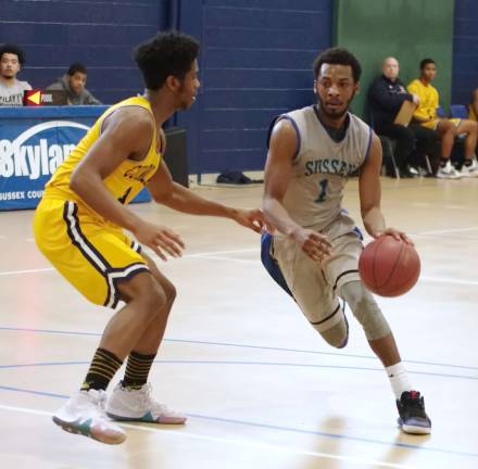 Sussex men's basketball team falls to Cumberland Sussex County's Samir Wheeler dribbles the ball as Cumberland County's Phil Cisrow defends. Wheeler scored 15 points.