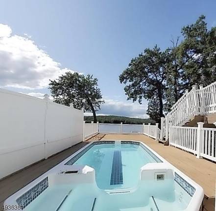 Custom-built house overlooks Lake Hoptacong