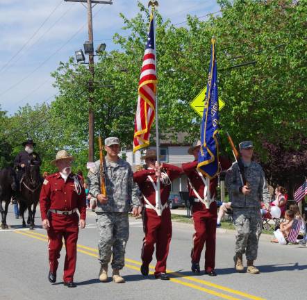 Honor guard leading the parade down Church Street. The soldiers in uniform are both Vernon home town boys. James Glading from Barry Lakes (second from left) and Jasen Bellusci of Cliffwood Lake (at the far right).