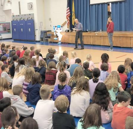 Chen Tao is introduced to students at Rolling Hills school.