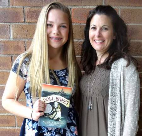 Glen Meadow Middle School student Emily McGovern and Language Arts teacher Jaqueline Clifford.